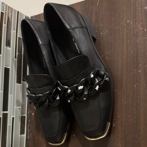Chic Black Loafers with Chain Accent